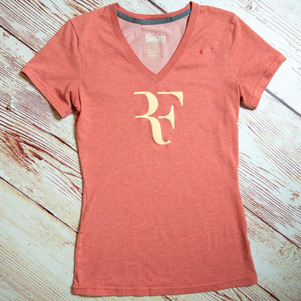Nike Dri-fit orange top.  Roger Federer. Tennis